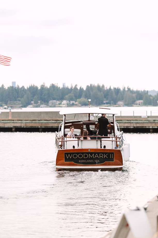 bride and groom heading out on the boat 